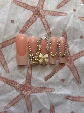 Pink Press-On Nails with Rhinestones, Flowers, and Bow Charms